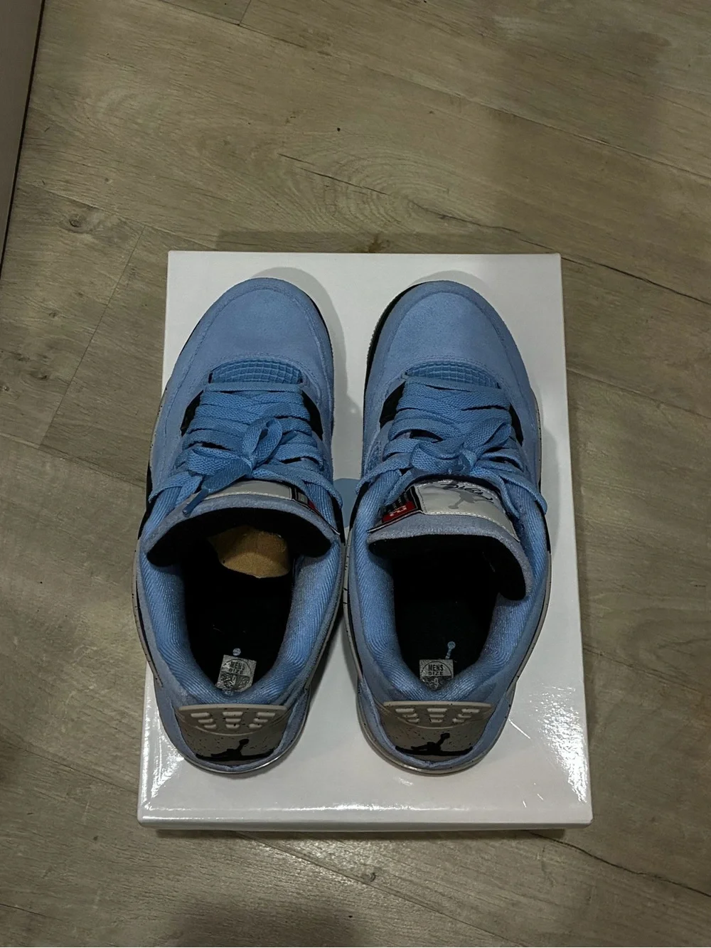 Air Jordan 4 UNC Men’s Athletic Shoes - Light Blue and Black